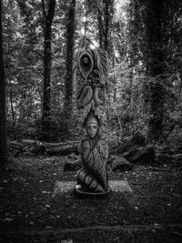 Statue of buddha in forest