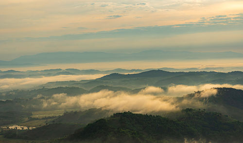 Scenic view of mountains against sky during sunset