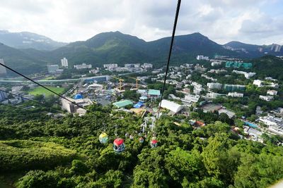 View of town against cloudy sky