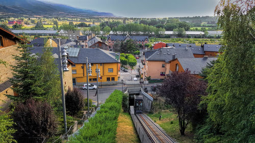 High angle view of houses and buildings in city