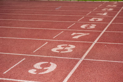 High angle view of numbers on running track