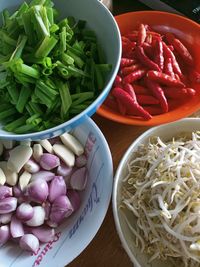 High angle view of chopped vegetables in bowl on table