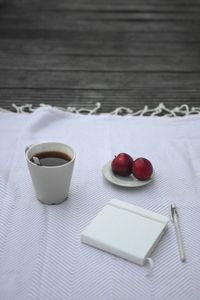 High angle view of coffee cup on table