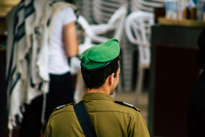 Rear view of man wearing hat