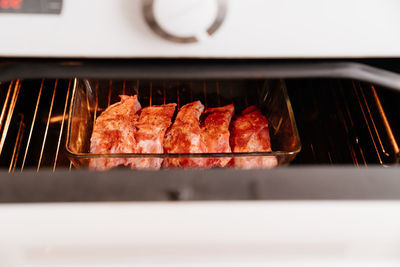 Close-up of meat on barbecue grill