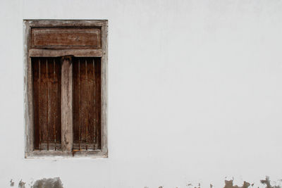 Old building against sky during winter