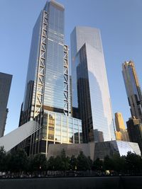 Low angle view of modern buildings against sky