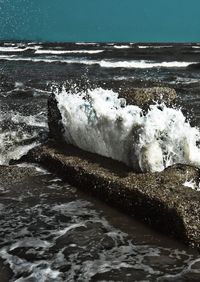 Close-up of sea waves splashing on shore