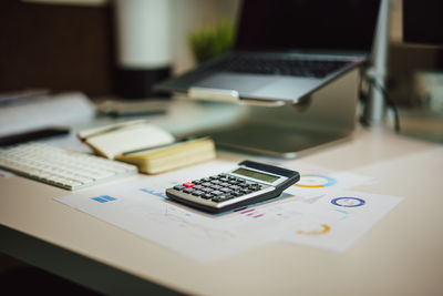 Close-up of calculator on table