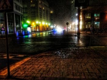 Wet street at night