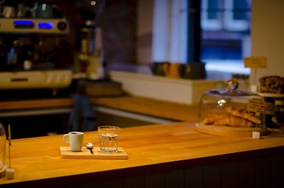 Wine bottles on table in restaurant