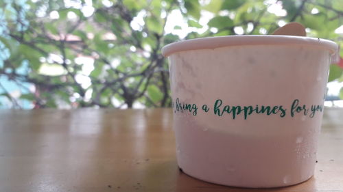 Close-up of coffee cup on table