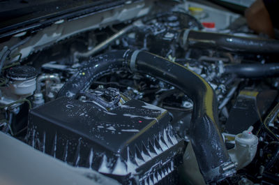 Close-up of car getting washed