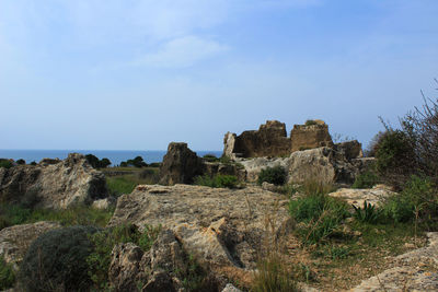 Scenic view of cliff against clear sky