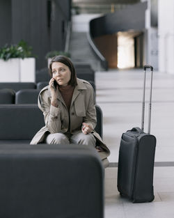 Young woman using mobile phone