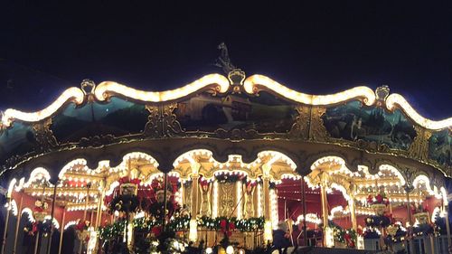 Illuminated christmas decorations during winter at night