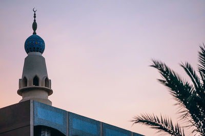 Low angle view of statue against sky