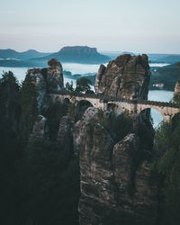 Scenic view of cliff against sky