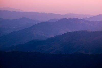 Scenic view of mountains against sky during sunset