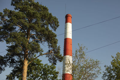 Low angle view of smoke stack against sky