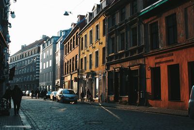 Street in city against sky