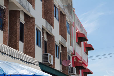 Low angle view of buildings against sky