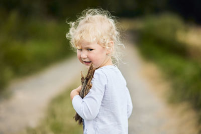 Portrait of smiling girl outdoors