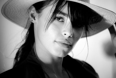 Close-up portrait of a smiling young woman