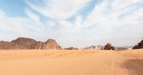 Panoramic view of desert against sky