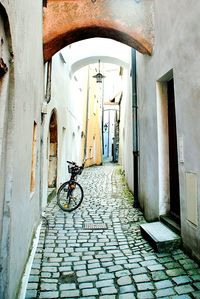 Narrow alley in front of building