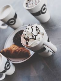 High angle view of coffee cup on table