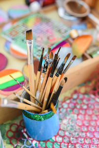 Close-up of paintbrushes on table