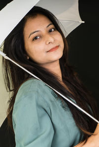 Portrait of smiling young woman