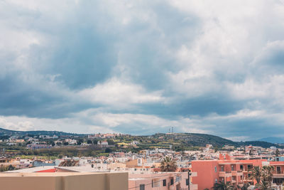 High angle shot of townscape against sky