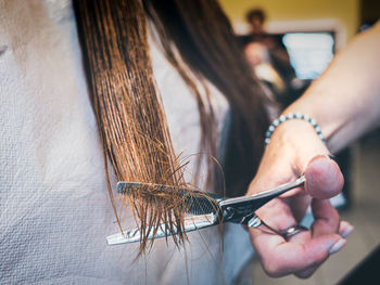 Close-up of woman holding hands