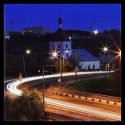 Light trails on street light at night