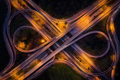 High angle view of light trails on elevated road