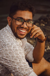 Portrait of young man wearing glasses