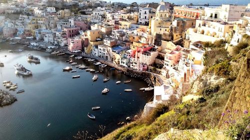 High angle view of townscape by sea