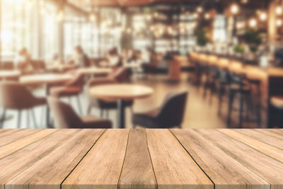 Close-up of wooden table in restaurant