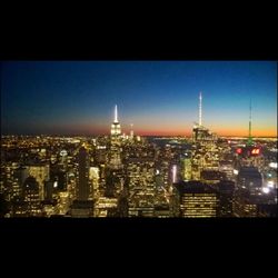 Illuminated cityscape at night