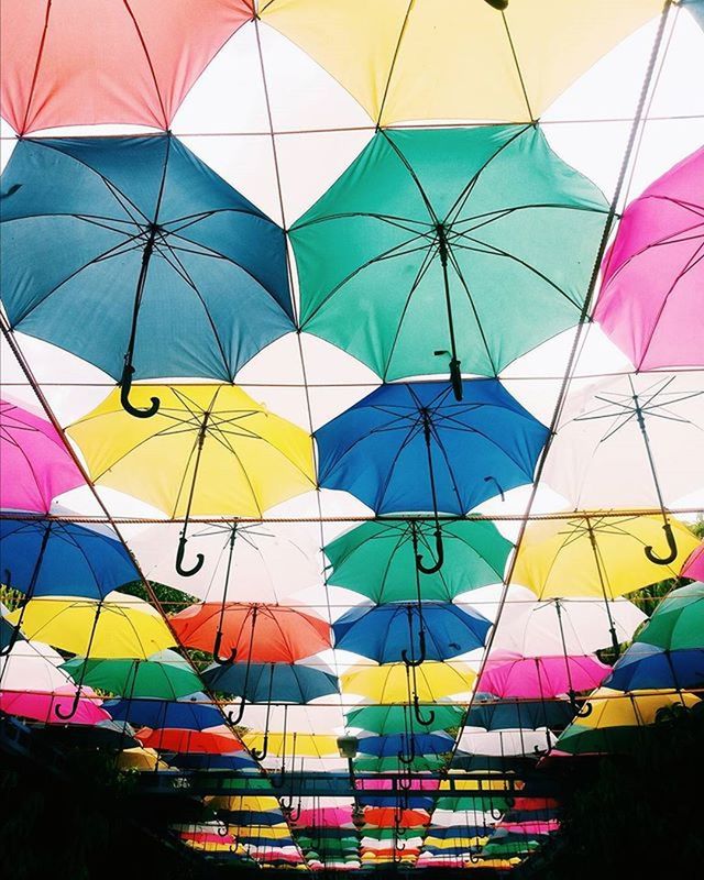 multi colored, colorful, pattern, umbrella, backgrounds, full frame, design, variation, yellow, low angle view, geometric shape, balloon, in a row, shape, hot air balloon, day, no people, indoors, creativity, protection