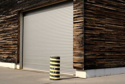 Stack of shutter against building