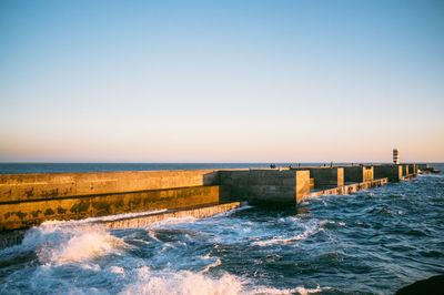 Scenic view of sea at sunset