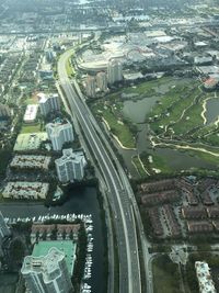 Aerial view of road in city