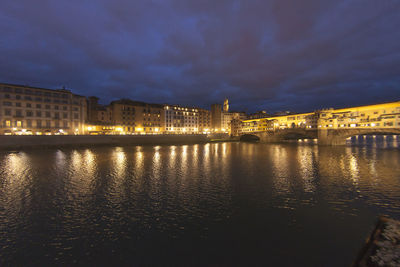 Illuminated buildings in city at night