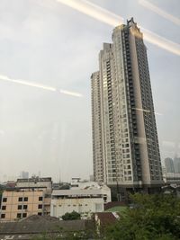 Low angle view of modern buildings against sky