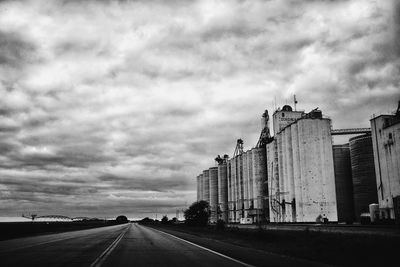 View of road against cloudy sky