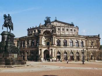 Statue of historic building against sky