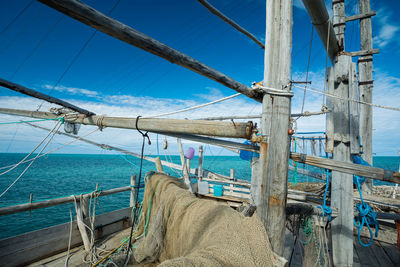 Sailboats on sea against blue sky